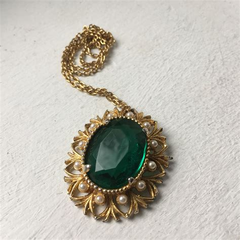 Vintage Emerald Pendants .